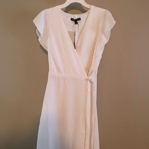 White wrap dress with flutter sleeves